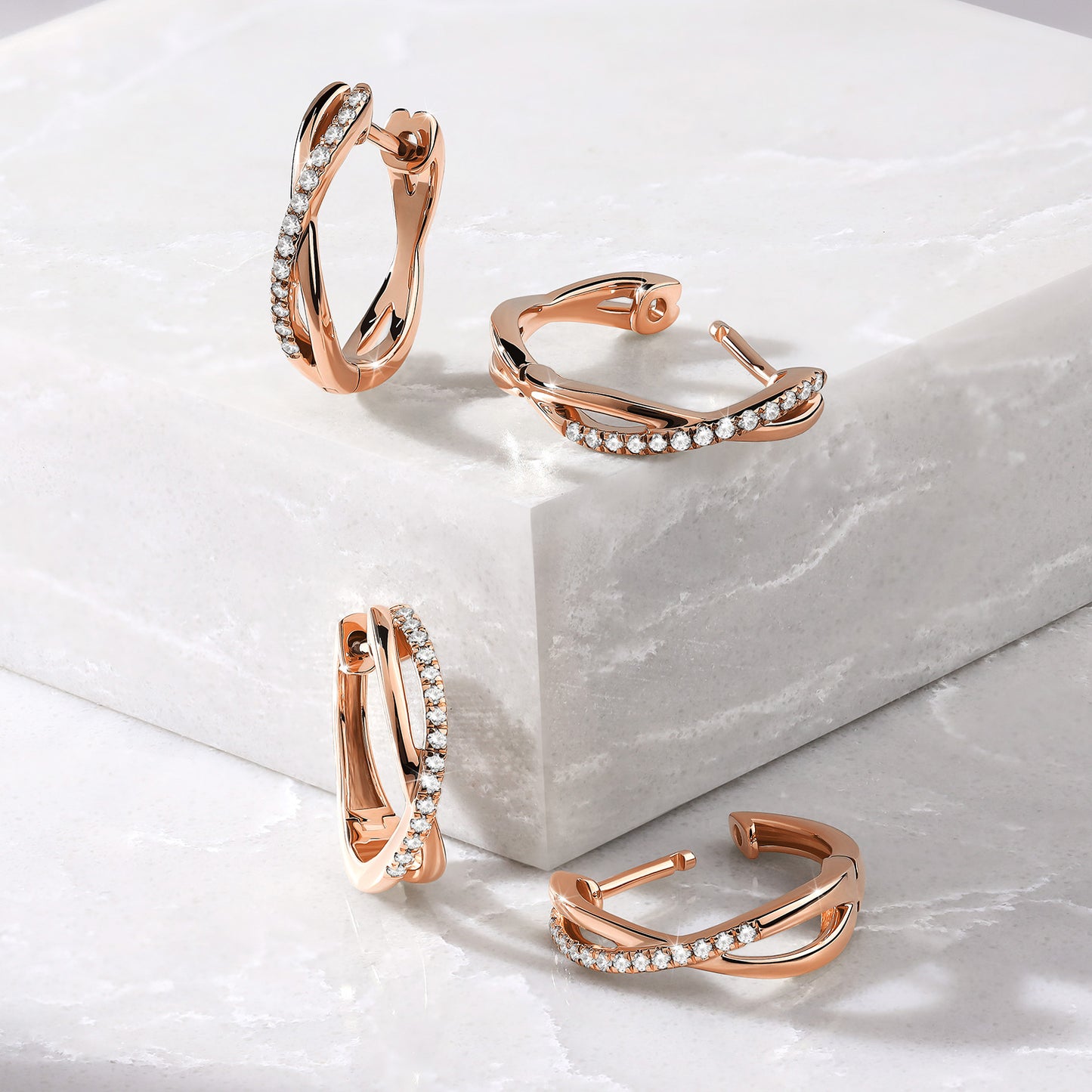 Radiant Twisted Huggie Hoops