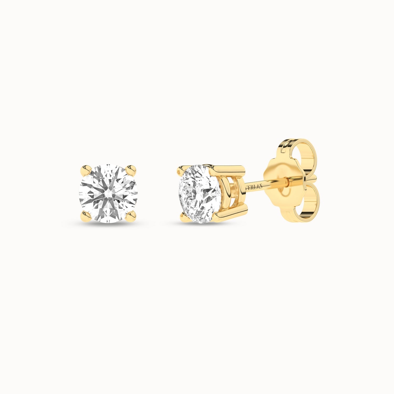 Round Solitaire Studs_Product Angle_3/4Ct. - 2