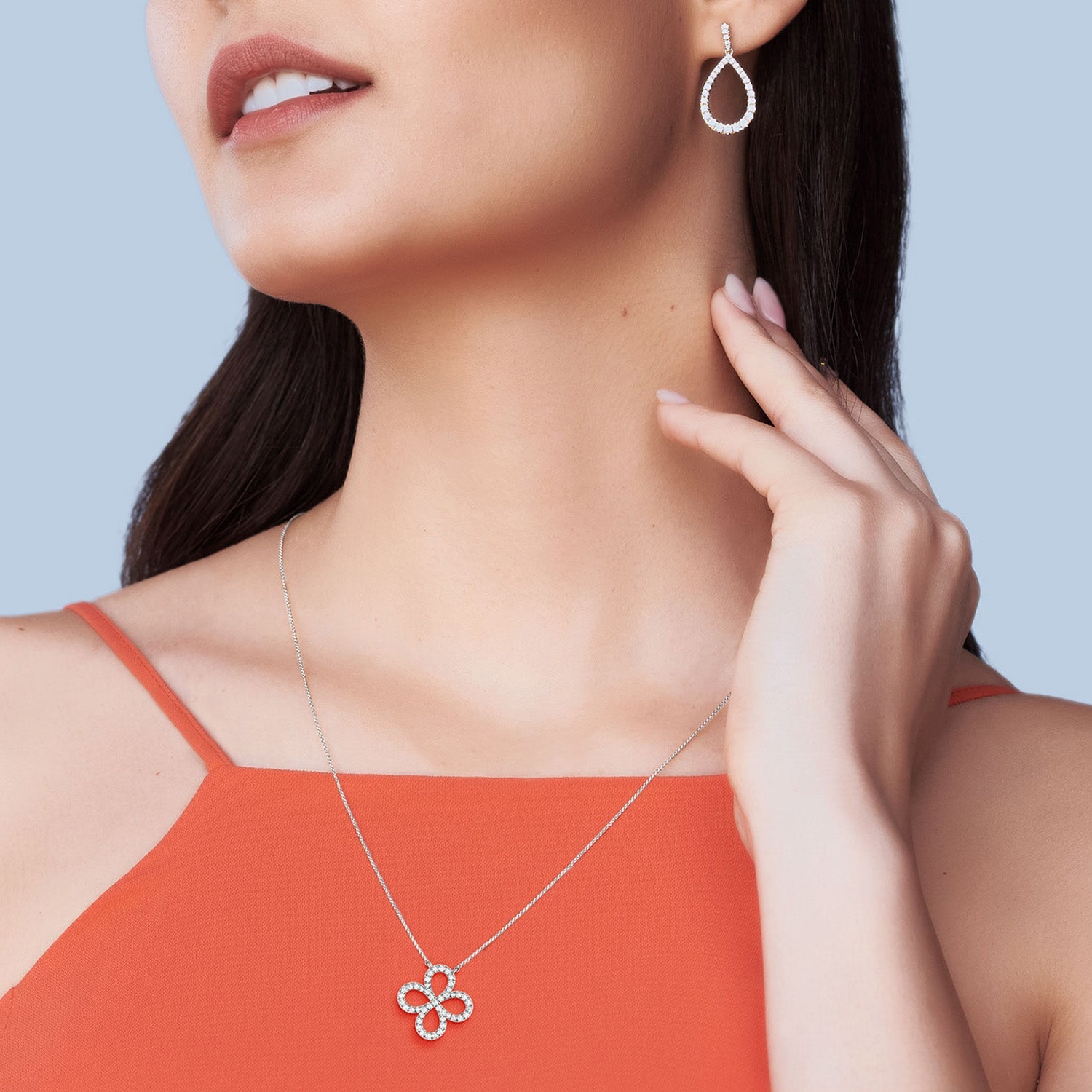 Infinity-Clover Silhouette Necklace_Product Angle_Lifestyle Image