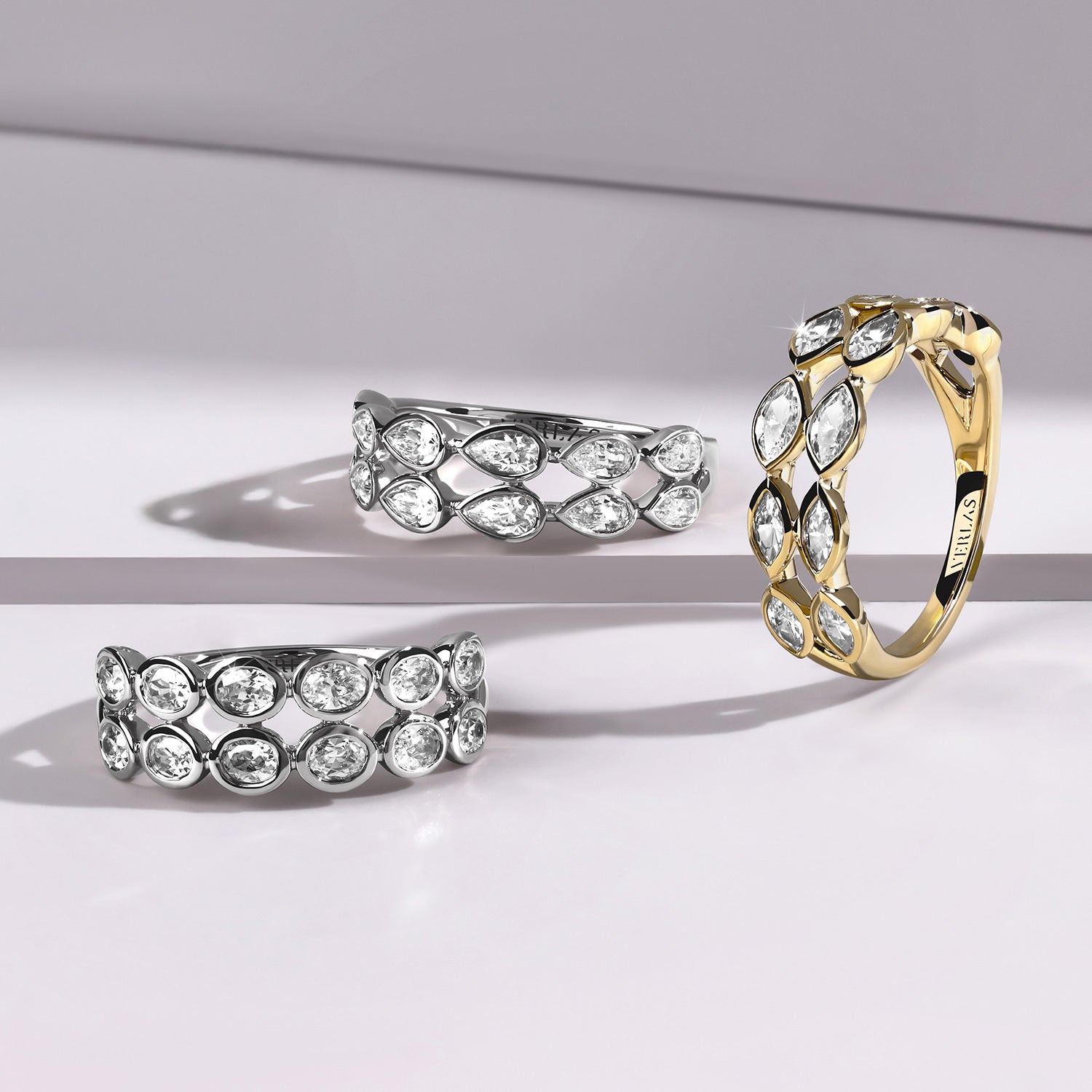 Two-Tier Pear Bezel-Set Diamond Band