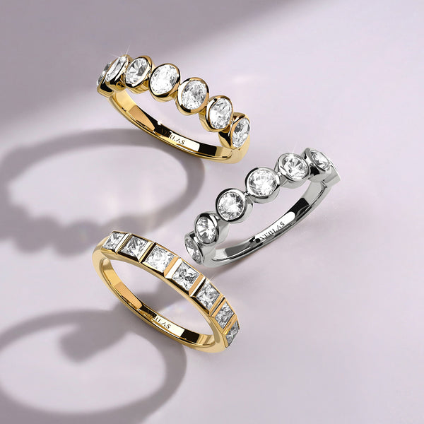 Oval Bezel-Set Half-Eternity Diamond Band